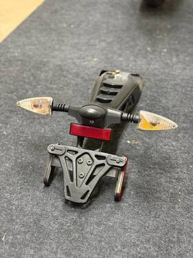 T2306981 Triumph 11-15 Speed Triple 1050 Oem License Plate Bracket With Turn Signals