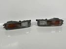 Nissan Skyline ECR33 Oem Front Bumper Turn Signal Lamp Lens Set 210-66217. Fixed Price $469.91.