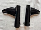 1965-66 Triumph Front Fork Headlamp Ears H1887 H1888. Fixed Price $50.00.