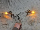 1990 Suzuki DR650S Front Turn Signal Mount Bracket. Fixed Price $25.00.