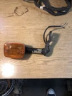 1983 Suzuki XN85 Left Rear Turn Signal And Bracket #35701-45570-999. Fixed Price $87.50.