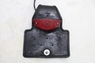 80-83 Yamaha XT250 Oem Rear Back Tail Light W Mount Bracket. Fixed Price $41.30.