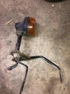 82,83 Honda Ft -500 Oem Rear Turn Signal And Bracket. Fixed Price $39.00.